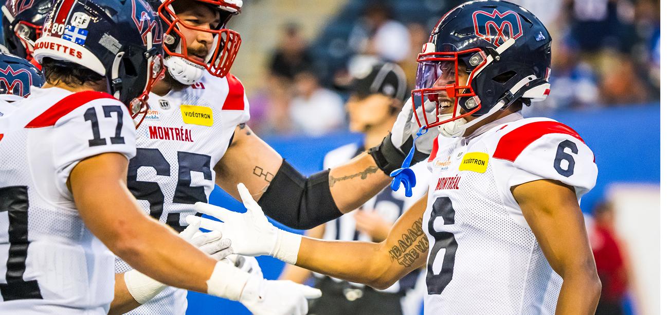 Tyson Philpot (right, #6) celebrating with his Montreal Allouettes teammates